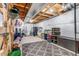 Organized basement area with storage containers and open ceiling at 6746 S Biloxi Ct, Aurora, CO 80016