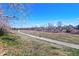 Scenic walking path with natural surroundings, ideal for outdoor recreation and enjoying the neighborhood at 2154 S Joplin Way, Aurora, CO 80013