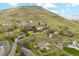 Stunning aerial view featuring hillside homes and lush greenery, showcasing a vibrant neighborhood at 4305 Easley Rd, Golden, CO 80403