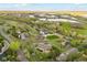Breathtaking aerial perspective of a hillside community surrounded by mature trees and open spaces at 4305 Easley Rd, Golden, CO 80403