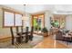 Dining room with modern table, stylish rug, and great natural light at 4305 Easley Rd, Golden, CO 80403
