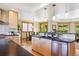 Bright kitchen with stainless appliances, eat in dining area, and outdoor views at 4305 Easley Rd, Golden, CO 80403