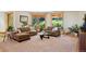 Cozy living room with plush furniture, natural light, and neutral color palette at 4305 Easley Rd, Golden, CO 80403