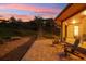 Cozy patio with stone flooring, wooden chairs, and a serene garden view at 4305 Easley Rd, Golden, CO 80403