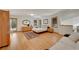 Bright bedroom featuring wood floors and direct access to the outdoors at 5808 Crestbrook Cir, Morrison, CO 80465