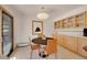Cozy breakfast nook features built-in cabinets, neutral decor, and a round table with seating for four at 5808 Crestbrook Cir, Morrison, CO 80465