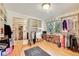 Large walk-in closet with custom shelving, hanging space, and natural light at 5808 Crestbrook Cir, Morrison, CO 80465