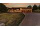 A charming single-story home with a brick exterior, two-car garage, and well-manicured lawn at 5808 Crestbrook Cir, Morrison, CO 80465