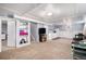 Finished basement with a tv area, exercise area, and wet bar perfect for entertaining at 241 S 15Th Ave, Brighton, CO 80601