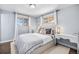 Serene bedroom featuring soft colors, natural light, and stylish decor at 241 S 15Th Ave, Brighton, CO 80601