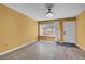 Bright entryway features wood floors, window, and white door at 2181 S Troy Way # 103, Aurora, CO 80014