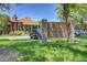 Willow Ridge clubhouse featuring pool, brick construction, and community signage in a landscaped setting at 2181 S Troy Way # 103, Aurora, CO 80014
