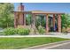 Community clubhouse featuring a striking brick facade and expansive windows at 2181 S Troy Way # 103, Aurora, CO 80014