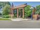 Community clubhouse featuring a striking brick facade and expansive windows at 2181 S Troy Way # 103, Aurora, CO 80014