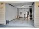 Two car garage includes room for storage and a refrigerator at 2181 S Troy Way # 103, Aurora, CO 80014