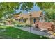 Attractive townhomes with manicured lawns and inviting entrances at 2181 S Troy Way # 103, Aurora, CO 80014