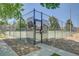 Community tennis courts enclosed by a chain link fence at 2181 S Troy Way # 103, Aurora, CO 80014