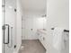 Bathroom with a glass-enclosed shower and double sink vanity providing a luxurious feel at 285 Clementina St, Louisville, CO 80027