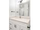 Bathroom featuring quartz countertop, modern vanity, and matte black finishes at 285 Clementina St, Louisville, CO 80027