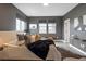 Serene main bedroom with plush bedding, stylish decor, and large windows at 285 Clementina St, Louisville, CO 80027
