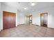 Spacious bedroom with tile flooring, closet and multiple entries at 3160 Bella Rosa Pkwy, Longmont, CO 80504