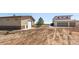 Sprawling property featuring a modern home and large barn, ideal for rural living and equestrian pursuits at 3160 Bella Rosa Pkwy, Longmont, CO 80504