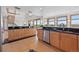 Bright kitchen features sleek countertops and stainless steel appliances, perfect for cooking and entertaining at 3160 Bella Rosa Pkwy, Longmont, CO 80504