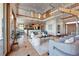 Bright living room featuring soaring ceilings, and modern finishes, creating an inviting space at 3160 Bella Rosa Pkwy, Longmont, CO 80504