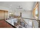 Open concept living area with a second story and lots of natural light at 3160 Bella Rosa Pkwy, Longmont, CO 80504