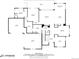 Detailed first floor plan featuring spacious kitchen, dining area, living room, and three car garage at 8750 Red Primrose St, Franktown, CO 80116