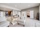 Open-concept living room featuring plush seating and a casual, inviting atmosphere at 8750 Red Primrose St, Franktown, CO 80116