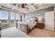 Serene main bedroom with a coffered ceiling, balcony access, and scenic outdoor views from the patio doors at 8750 Red Primrose St, Franktown, CO 80116