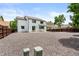 Spacious backyard with low-maintenance gravel, perfect for outdoor activities and relaxation at 11383 Oakland Dr, Commerce City, CO 80640