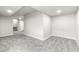 Finished basement area featuring plush carpeting and ample space at 11383 Oakland Dr, Commerce City, CO 80640