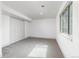 Well-lit bedroom featuring plush carpet, a spacious closet, and a large window at 5814 Cole Way, Arvada, CO 80004