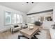 Open concept living area with an island, large windows, and modern furnishings creates a relaxing space at 5814 Cole Way, Arvada, CO 80004