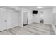 Finished basement with bathroom and multiple entries to storage spaces at 17 E Belleview Ln, Greenwood Village, CO 80121