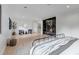 Spacious main bedroom features a fireplace, seating area, and walk-in closet at 17 E Belleview Ln, Greenwood Village, CO 80121