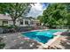 Inviting backyard pool and lush landscape is perfect for outdoor living and entertaining at 17 E Belleview Ln, Greenwood Village, CO 80121