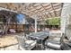 Outdoor patio with seating area and pergola perfect for relaxing or entertaining at 20604 E 38Th Pl, Denver, CO 80249