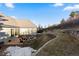 Backyard patio with a stone firepit and landscaping; perfect for outdoor entertaining at 4788 Silver Pine Dr, Castle Rock, CO 80108