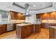 Beautiful kitchen with wood cabinets, stainless steel appliances, and granite countertops at 4788 Silver Pine Dr, Castle Rock, CO 80108