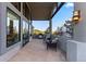Relaxing outdoor patio space with stone flooring and comfortable seating, perfect for enjoying the surrounding views at 4788 Silver Pine Dr, Castle Rock, CO 80108