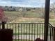 Scenic backyard view with lush greenery and distant mountain peaks at 6340 Ashburn Ln, Highlands Ranch, CO 80130