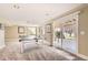 Carpeted basement with sliding glass door to backyard at 6340 Ashburn Ln, Highlands Ranch, CO 80130