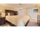 Comfortable bedroom with large bed, soft lighting, and closet at 6340 Ashburn Ln, Highlands Ranch, CO 80130