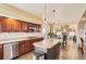 Well-appointed kitchen featuring granite counters, stainless appliances, and hardwood flooring at 6340 Ashburn Ln, Highlands Ranch, CO 80130
