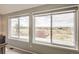 Expansive windows fill this home with natural light and showcase the beauty of the outdoors at 6340 Ashburn Ln, Highlands Ranch, CO 80130