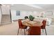 Finished basement featuring a dining area, lounge space, and gym equipment at 3149 W 35Th Ave, Denver, CO 80211