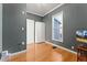 Cozy bedroom with hardwood floors, closet, and a bright window at 3300 W 2Nd Ave, Denver, CO 80219